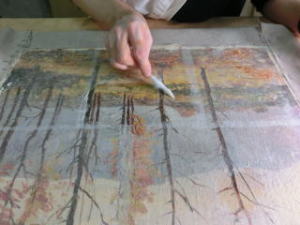 表打ちの和紙を除去 絵画の保存修復作業43